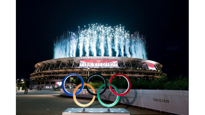 TOKYO, JAPAN - JULY 23: A general view outside the stadium as fireworks are let off during the Opening Ceremony of the Tokyo 2020 Olympic Games at Olympic Stadium on July 23, 2021 in Tokyo, Japan. (Photo by Lintao Zhang/Getty Images)